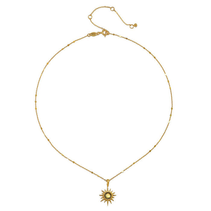 Elegant display of the North Star Labradorite Starburst Necklace on a white background, highlighting the sunburst pendant and faceted labradorite stone. Ideal as spiritual jewelry, this piece symbolizes guidance and serves as a powerful talisman in one's journey of self-discovery.