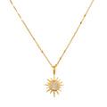 North Star Moonstone Starburst Necklace featuring a luminous moonstone pendant set in an 18kt gold plate starburst design, representing spiritual jewelry and meditation. Ideal for those seeking a meaningful talisman for manifestation, protection, and yoga.