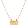 October Pink Tourmaline Sunburst Birthstone Tablet Necklace featuring an engraved sunburst design and accented with a pink tourmaline stone. This spiritual jewelry symbolizes vitality, protection, and meaningful manifestation, perfect for meditation and yoga enthusiasts.