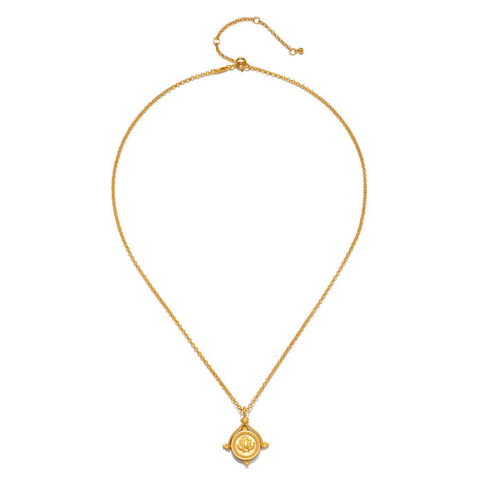 Gold-toned chain necklace with adjustable clasp and spinning lotus pendant.