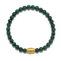 Path to Healing Malachite Gemstone Men's Bracelet featuring smooth malachite beads and a golden 'PEACE' bead, ideal for spiritual jewelry, meditation, and protection while embodying love and healing. This piece is designed for mindfulness and meaningful manifestation.