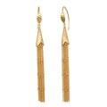 Gold-tone drop earrings with hammered cone studs and chain tassels, shown as a pair on wires.