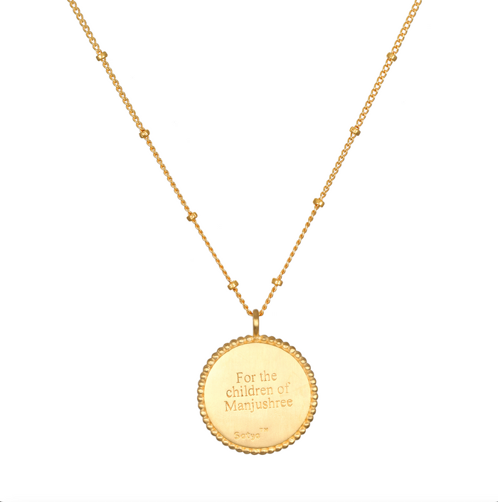 Pathway to Love Necklace in gold featuring an engraved message for the children of Manjushree. This charm serves as spiritual jewelry that embodies meanings of protection, meditation, and a connection to the zodiac, perfect for manifesting positive energy.