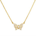Gold-tone chain necklace with butterfly pendant set with cubic zirconia stones and oval center stone.