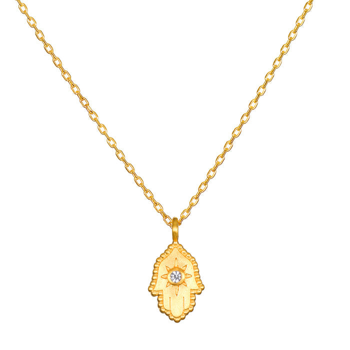 Protective Hand White Topaz Hamsa Necklace featuring a beaded hamsa hand pendant with a brilliant white topaz, symbolizing protection, clarity, and manifestation. Perfect spiritual jewelry for meditation, and a meaningful talisman for those who practice yoga and seek blessings.