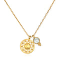 Radiate Love Sun Necklace featuring an 18k gold plated sun charm and blue topaz, perfect for those who appreciate spiritual jewelry and seek meaningful connections in yoga and meditation.