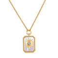 Gold chain necklace with rectangular mother of pearl pendant featuring a gold sun design and center crystal.