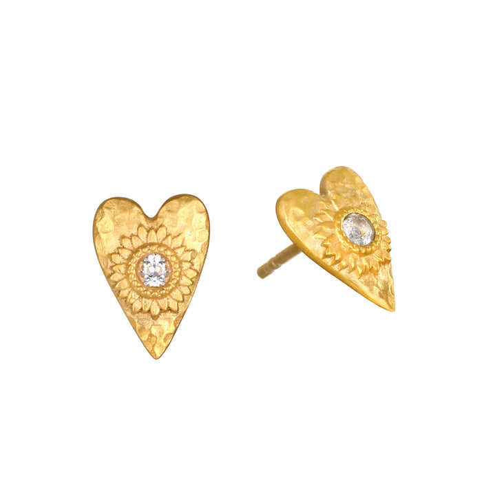 Sacred Connection Heart Lotus Stud Earrings beautifully crafted with 18k gold plate and featuring sparkling white topaz, embodying love and spirituality. Ideal for meditation and manifestation, these earrings serve as a meaningful talisman for protection and connection to the sun and moon energies in yoga and spiritual practices.