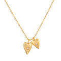 Stunning Sacred Connection White Topaz Lotus Heart Necklace featuring two heart-shaped pendants, symbolizing love, clarity, and manifestation. This spiritual jewelry piece is perfect for meditation and as a meaningful talisman for protection in yoga practice, representing both the sun and moon.