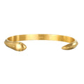 Sacred Guidance Snake Cuff Bracelet displayed elegantly, representing spiritual jewelry and a talisman for meditation and protection. The 18kt gold plated snake design signifies renewal, immortality, and is perfect for yoga practitioners seeking meaning and manifestation in their lives.