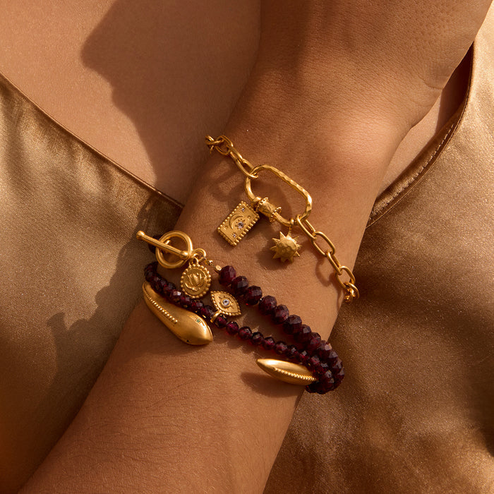 A detailed view of the Sacred Guidance Snake Cuff Bracelet alongside other spiritual jewelry pieces. This beautiful cuff symbolizes transformation and protection, making it a meaningful addition to any meditative practice or zodiac-themed gathering, perfect for manifestation and self-discovery.