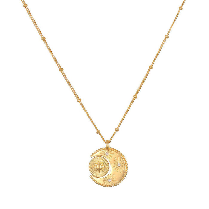 Sacred Realm Spinning Pendant Celestial Necklace showcasing an intricate design of sun and moon, perfect for spiritual jewelry enthusiasts, meditation, and charms that bring meaning to your yoga practice.