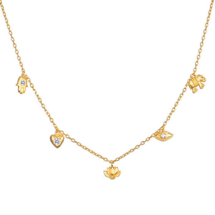 Gold-tone choker necklace with five dangling charms: hamsa hand, elephant, heart, eye, and lotus flower, each set with white