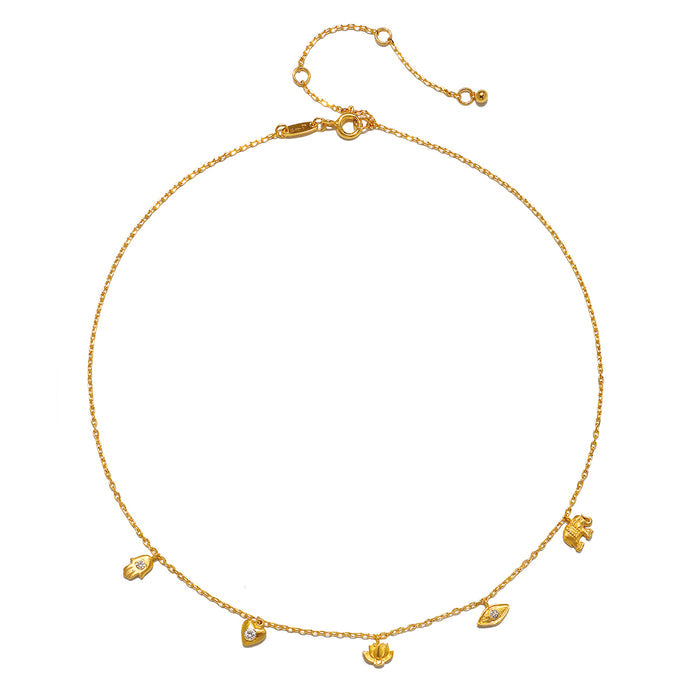 Gold-toned choker necklace with delicate chain and five small hanging charms including heart, lotus, and geometric shapes wit
