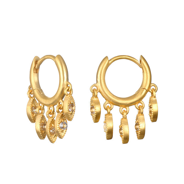 Scatter Light Huggie Earrings showcasing shimmering white topaz stones in an elegant design. These spiritual jewelry pieces symbolize clarity and openness, perfect for meditation and manifestation. Ideal for yoga enthusiasts and those seeking meaningful talismans inspired by the sun and moon.