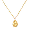 Shifting Consciousness Snake Necklace, an 18kt gold plated pendant featuring a delicate snake design; perfect for spiritual jewelry and meditation practices. This necklace embodies renewal and meaning, making it a great talisman for manifestation, protection, and yoga.