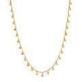 Shimmering Sky Choker Necklace featuring hammered golden discs that scatter light, symbolizing protection and manifestation, perfect for spiritual jewelry and yoga enthusiasts.