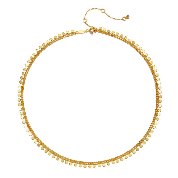 The Shine a Light Coin Chain Necklace laid flat, displaying its intricate coin detail. This piece is a perfect addition to anyone's spiritual wardrobe, representing meaning and protection in meditation.