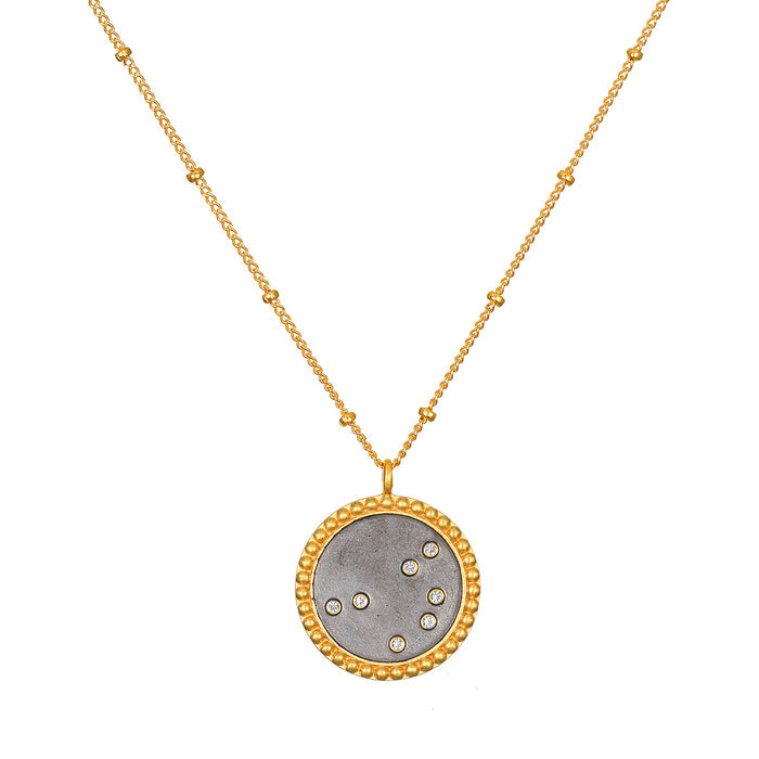 Shine in Sisterhood Constellation Necklace featuring a stunning 18kt gold plated pendant with seven stars of pyrite, perfect for spiritual jewelry lovers. This necklace embodies meditation, serving as a meaningful talisman inspired by the Pleiades constellation, ideal for your yoga practice and manifestation journey.