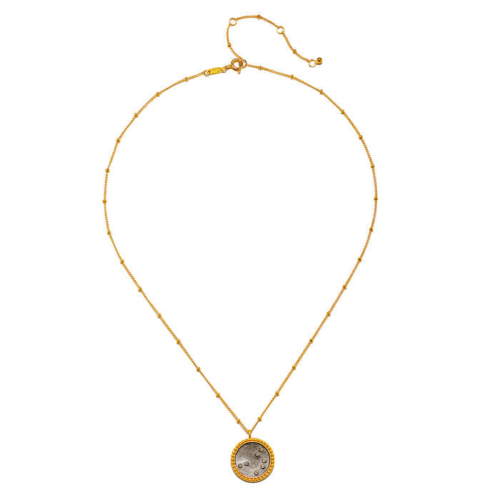 The Shine in Sisterhood Constellation Necklace displayed elegantly against a plain background, showcasing its charm and significance. This piece is a beautiful representation of spiritual jewelry that enhances your connection to the universe, aiding in meditation and manifestation practices.