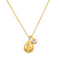 Gold chain necklace with teardrop-shaped snake pendant and round white topaz charm.