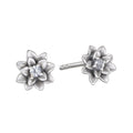 Soul Renewal Silver Lotus Earrings showcasing a beautiful lotus flower design with white topaz accents, symbolizing new beginnings and potential. These spiritual jewelry pieces serve as a perfect talisman for meditation and manifestation, connecting you to your zodiac energies while embodying protection and meaningful charm in your everyday look.