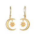 Stunning Spirit in Transformation Lotus Moon Earrings featuring a crescent moon and lotus design, perfect for spiritual jewelry enthusiasts. Ideal for meditation, this talisman embodies the essence of the zodiac and offers protection, making it a meaningful charm for manifestation and yoga practices.
