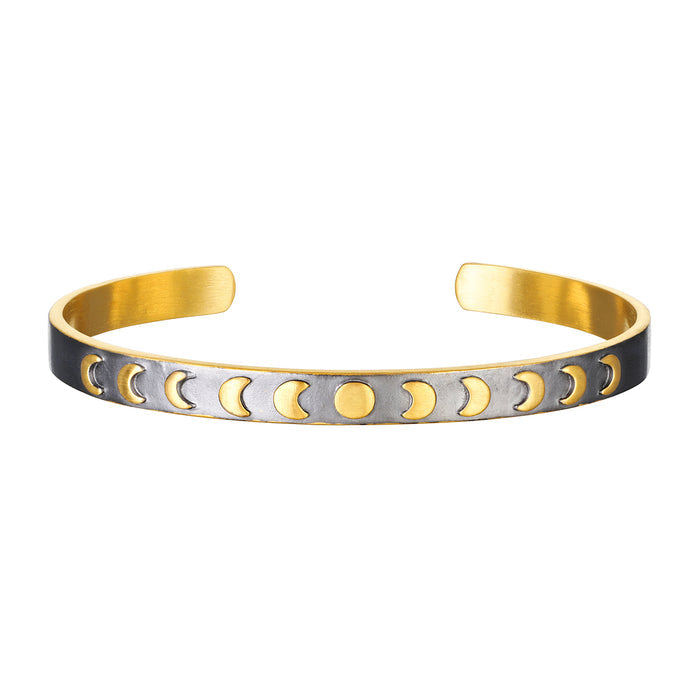 Spiritual Evolution Moon Phase Cuff featuring phases of the moon on a gunmetal background. This stylish spiritual jewelry piece symbolizes nourishment, protection, and the goddess, making it perfect for meditation, manifestation, and yoga practice.