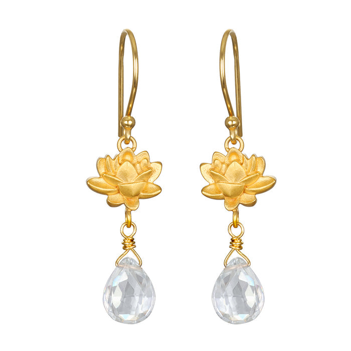 Spiritual Journey Lotus Crystal Earrings showcasing delicate gold lotus flowers and clear crystal drops, a perfect talisman for protection and meditation. This spiritual jewelry is meaningful for yoga and manifestation enthusiasts.