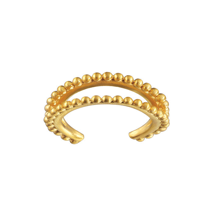 Stand By Your Side Ear Cuff, an elegant gold plate piece with dotted crescents, symbolizes spiritual jewelry and protection. Perfect for meditation practices and meaningful occasions, embracing the connection between sun, moon, and zodiac energies.