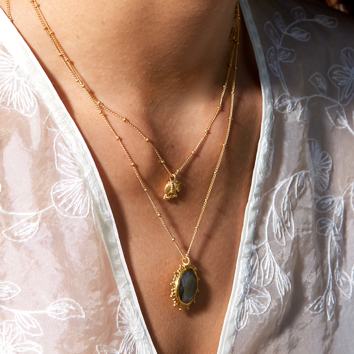 Detailed view of the Stand in Strength Elephant Necklace with the elephant pendant prominently displayed, ideal for those seeking symbolic gifts for yoga and manifestation.