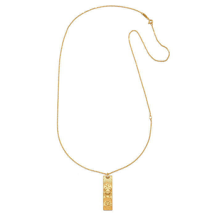 The Story of Cancer Zodiac Necklace showcased on a delicate chain, emphasizing its beautiful pendant. This spiritual jewelry not only captures the essence of zodiac signs but also serves as a talisman for meditation and offers a meaningful connection to the sun, moon, and manifestation.