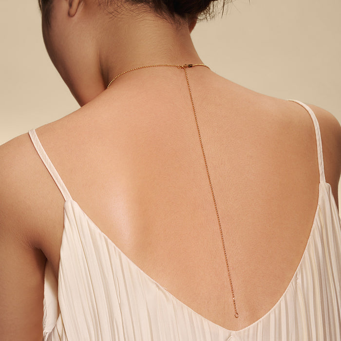 The back view of the Story of Virgo Zodiac Necklace highlighting the elegant chain design, perfect for spiritual jewelry lovers. This necklace serves as a soothing talisman in meditation, connecting to the zodiac's meaning while inviting manifestation and protection.