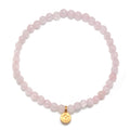 Supported In Love Lotus Rose Quartz Gemstone Bracelet showcasing a beautiful design, symbolizing love and compassion. This spiritual jewelry piece is ideal for meditation gifts and embodies meaningful qualities like manifestation and protection. Perfect for yoga enthusiasts and those seeking a sacred connection.