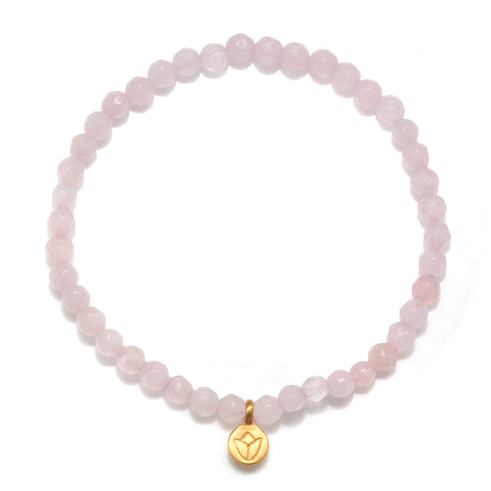 Supported In Love Lotus Rose Quartz Gemstone Bracelet showcasing a beautiful design, symbolizing love and compassion. This spiritual jewelry piece is ideal for meditation gifts and embodies meaningful qualities like manifestation and protection. Perfect for yoga enthusiasts and those seeking a sacred connection.