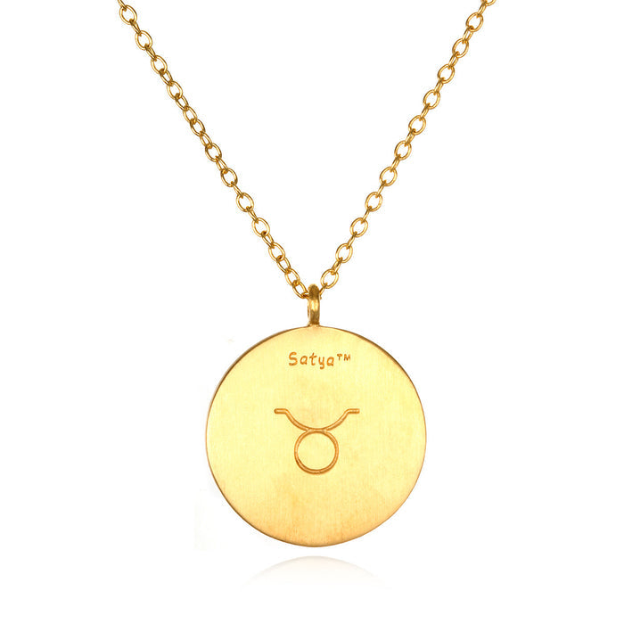 Elegant Taurus Zodiac Necklace showcasing a polished gold pendant engraved with the Taurus symbol. This spiritual jewelry piece serves as a symbolic amulet for manifestation and personal growth, ideal for those who seek meaning in their zodiac connection.