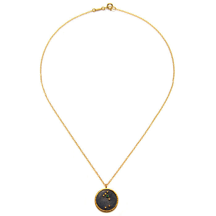 Taurus Zodiac Necklace featuring a circular pendant with a minimalist design, perfect for spiritual jewelry enthusiasts. This meaningful piece serves as a protective amulet and is ideal for meditation gifts, yoga, and mantra practices, symbolizing the Taurus zodiac's connection to self-love and emotional security.