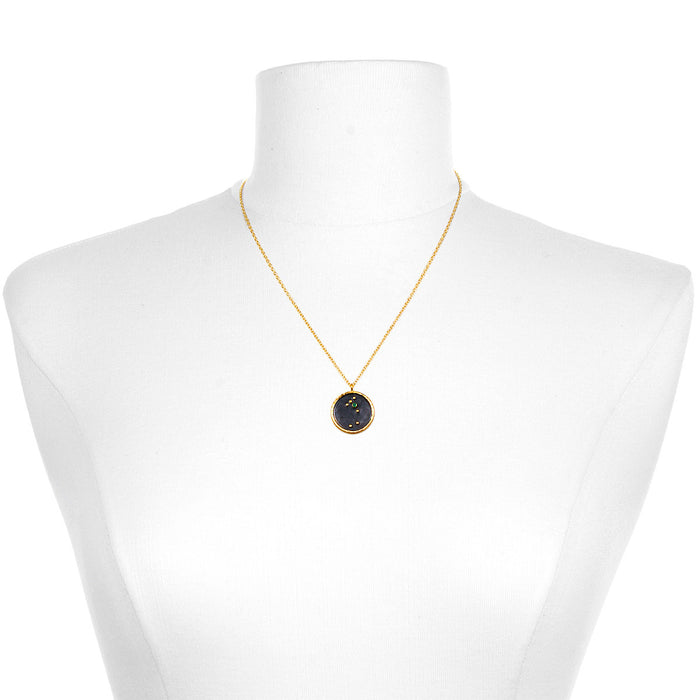 Taurus Zodiac Necklace displayed on a mannequin, showcasing its elegant design and 18kt gold plating. This symbolic jewelry piece is not just a beautiful accessory but also a manifestation tool, making it a perfect gift for lovers of yoga and spirituality. Its essence ties deeply to the Taurus zodiac's sacred qualities.