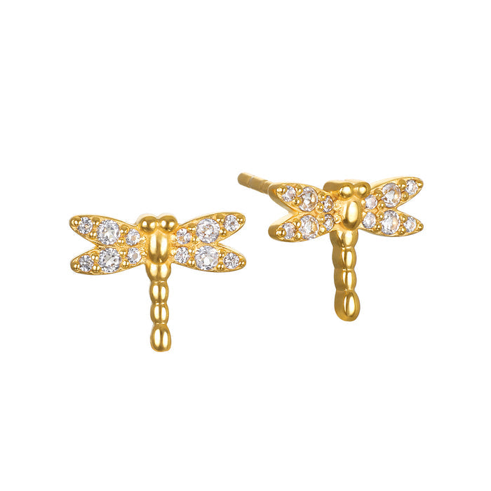 Pair of gold-tone dragonfly stud earrings with white crystal embellishments on wings and body.