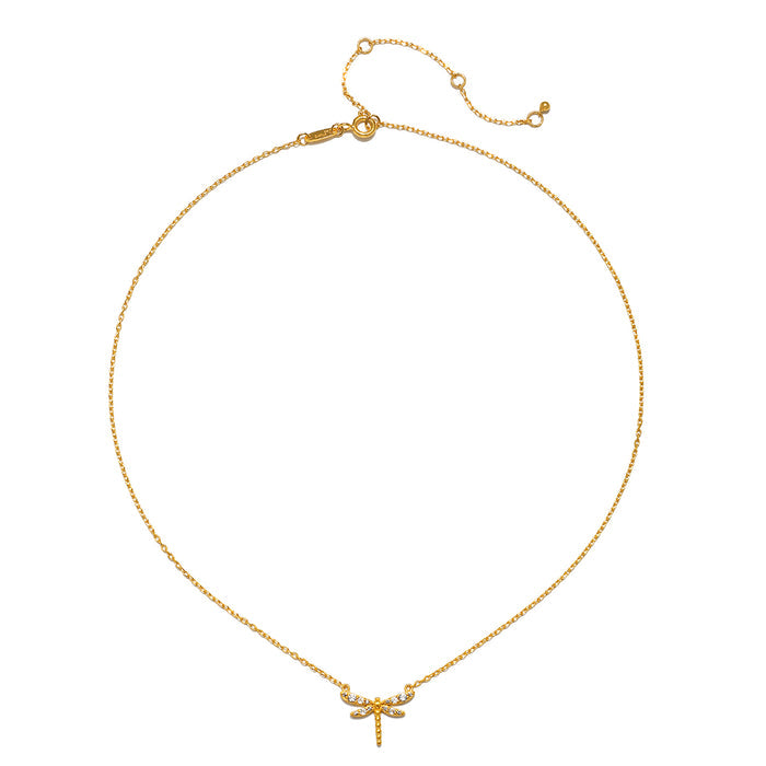Gold-toned chain necklace with dragonfly pendant featuring white topaz stones and adjustable clasp.