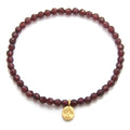 Tree of Life Garnet Gemstone Bracelet showcasing faceted garnet stones, symbolizing love and guidance. Perfect as spiritual jewelry for meditation gifts, this bracelet carries deep meaning and serves as a protective amulet for yoga and manifestation.