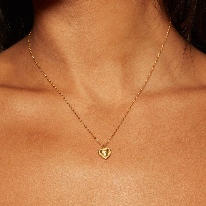 True Heart Gold Pendant Necklace showcased on a model, emphasizing its delicate design and spiritual significance, ideal for meditation, manifestation, and as a meaningful talisman in spiritual jewelry collection.