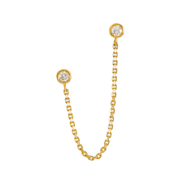 United by Light 14kt Gold Diamond Chain Earring showcasing two bezeled diamonds connected by a delicate chain, embodying spiritual jewelry and the essence of meaningful connections, perfect for meditation and manifestation practices.