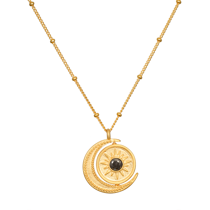 United in Light Spinning Pendant Necklace showcasing an 18kt gold plated design featuring a crescent moon and a sun centerpiece, perfect for spiritual jewelry, meditation, and manifestation. This meaningful talisman embodies the essence of protection and connection to the sun and moon, ideal for yoga and zodiac enthusiasts.
