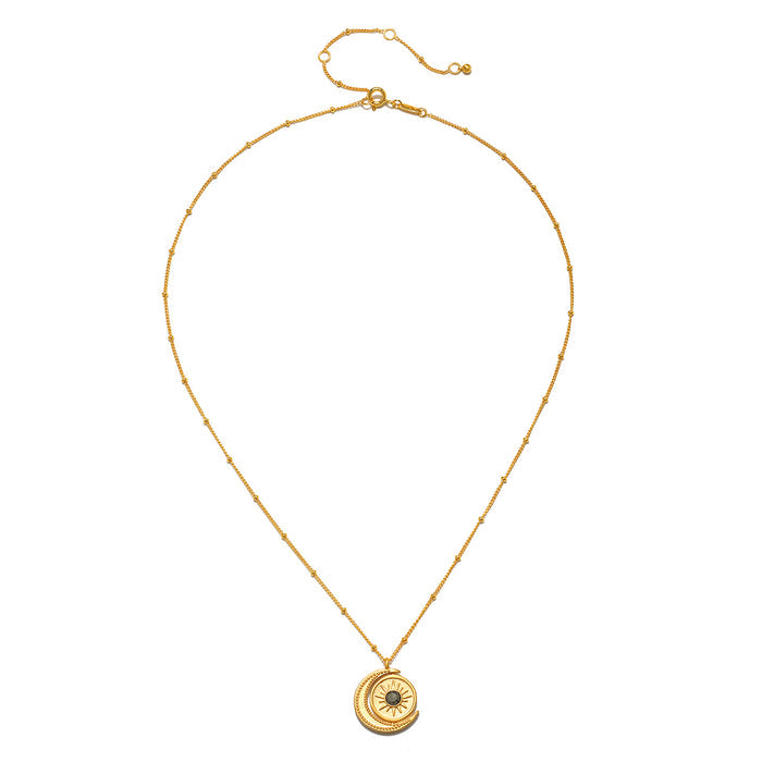 Back view of the United in Light Spinning Pendant Necklace showcasing an elegant chain and pendant. This spiritual jewelry piece incorporates sun and moon symbols, designed for protection and meaningful connections during meditation, yoga, and other spiritual practices.