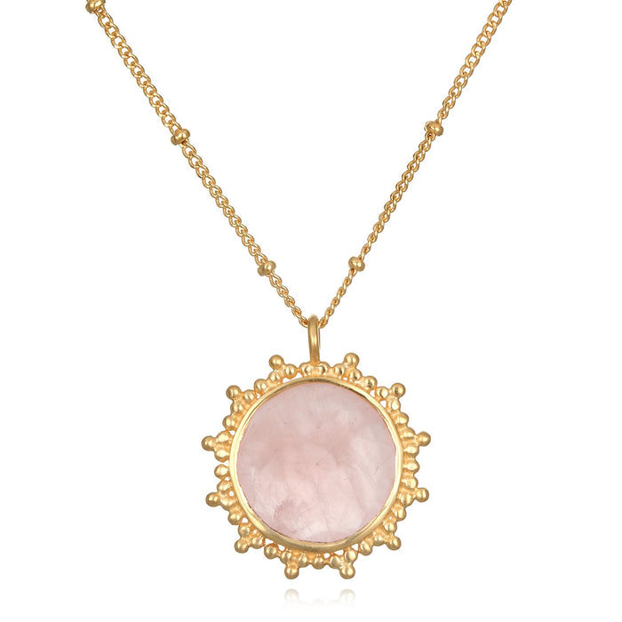 Unlimited Compassion Rose Quartz Gemstone Necklace featuring a stunning rose quartz pendant set in gold, perfect for spiritual jewelry and meditation, representing unconditional love and protection, ideal for yoga enthusiasts and those interested in meaningful manifestation.