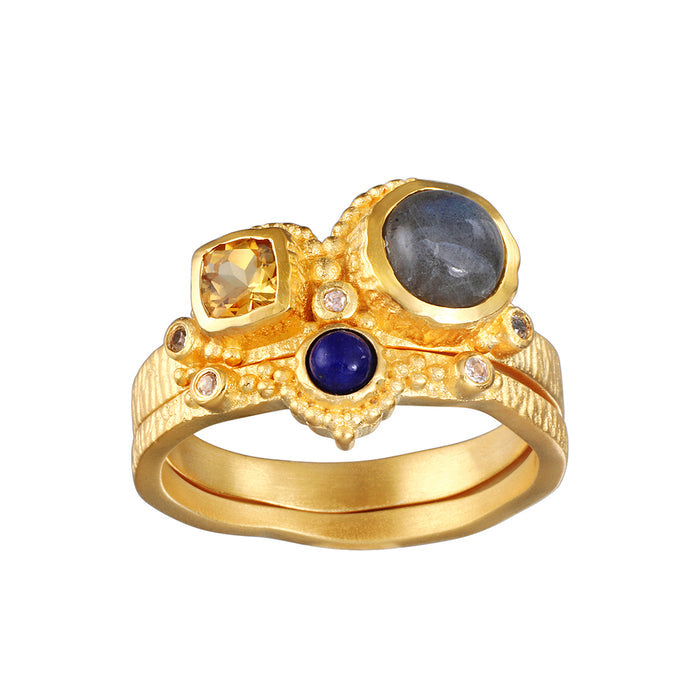 Vibrant Beauty Cluster Gemstone Ring Set displayed in a close-up view, showcasing the sparkling gemstones of citrine, labradorite, and lapis set in 18kt gold plate. This piece of spiritual jewelry embodies meanings of happiness, healing, and protection, perfect for meditation and yoga.