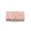 Weekend Journey Travel Jewelry Wrap Holder Pink, elegantly designed for spiritual jewelry. Made from soft microfiber, this holder protects your meaningful talismans like zodiac malas, providing a sense of yoga-inspired protection and manifestation while you travel.