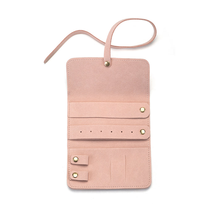 Another angle of the Weekend Journey Travel Jewelry Wrap Holder Pink, highlighting its spacious design for safely storing talismans. Ideal for meditation enthusiasts, this packable jewelry holder represents a blend of style and spiritual protection.
