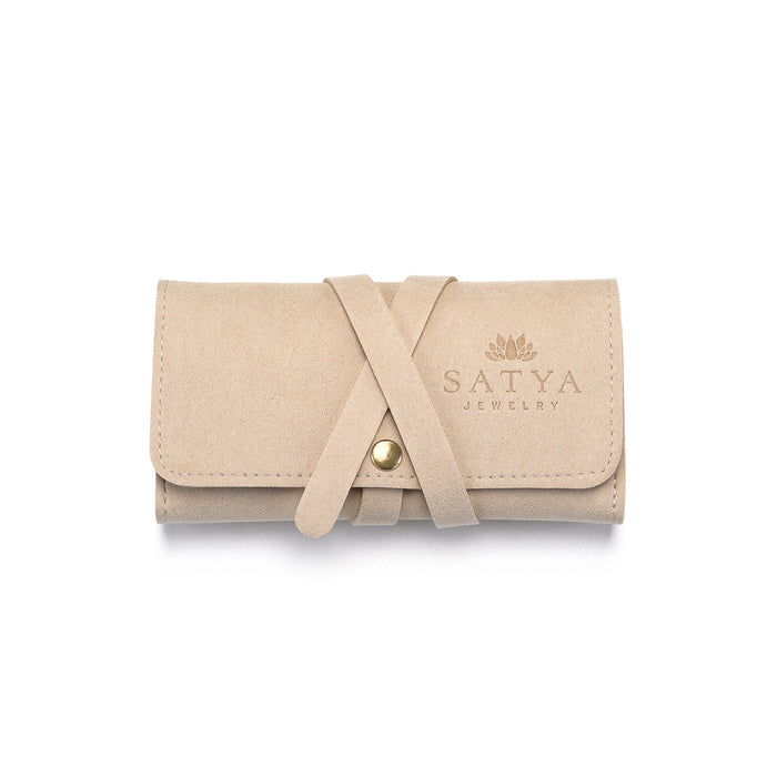 Weekend Journey Travel Jewelry Wrap Holder Tan featuring a soft tan microfiber exterior, ideal for keeping your spiritual jewelry safe. This jewelry organizer is perfect for storing meaningful talismans and is a must-have for meditation and yoga enthusiasts. With its stylish design, it offers protection and embodies the essence of the sun and moon.
